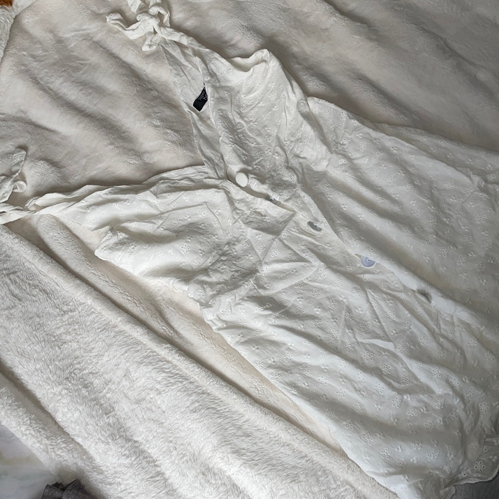 super cute white button up dress! Never worn with tags on
